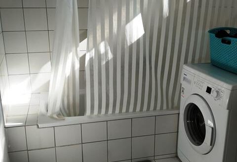 Wohnhaus mit Ladeneinheit in der Stadtmitte