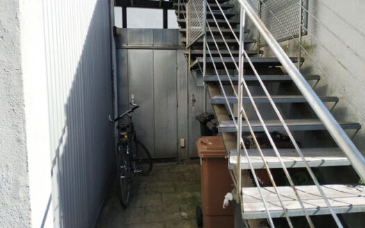 Wohnhaus mit Ladeneinheit in der Stadtmitte