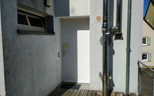 Wohnhaus mit Ladeneinheit in der Stadtmitte