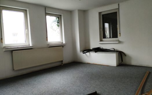 Renovierungsbedürftiges Wohn- und Geschäftshaus in der Innenstadt