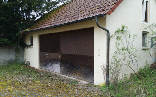 Renovierungsbedürftiges Wohn- und Geschäftshaus in der Innenstadt